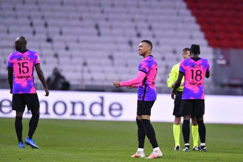 Kylian Mbappe celebrates after scoring a goal