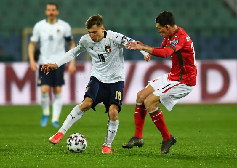 Nicolo Barella tries to shake off Georgi Kostadinov in a challenge..