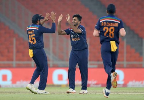 Shardul Thakur and Rohit Sharma celebrating the wicket of Eoin Morgan in the fourth T20I