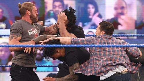 Roman Reigns and Jey Uso brawl with Edge and Daniel Bryan