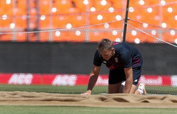 Joe Root inspects the pitch ahead of the 4th India v England Test