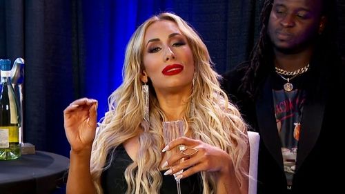 Carmella is no longer aligned with Reginald