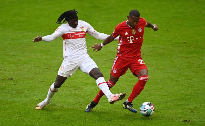 David Alaba tussles for the ball