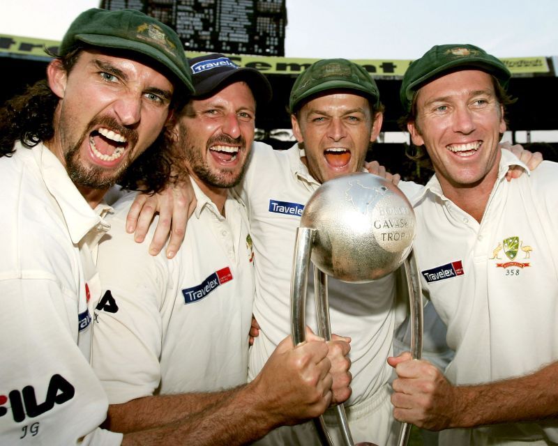 Glenn McGrath (right) celebrates the Border-Gavaskar Trophy victory with his teammates.