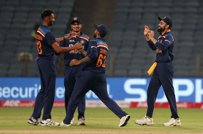 Prasidh Krishna (left) celebrating the fall of an England wicket in Pune.