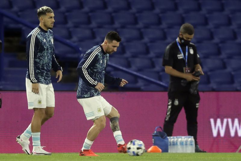 Leandro Paredes and Lionel Messi