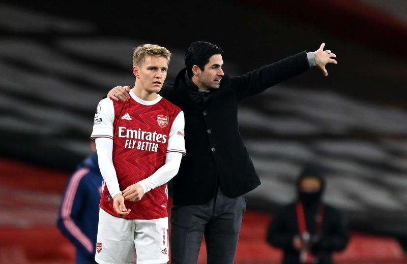 Martin Odegaard (left) and Mikel Arteta