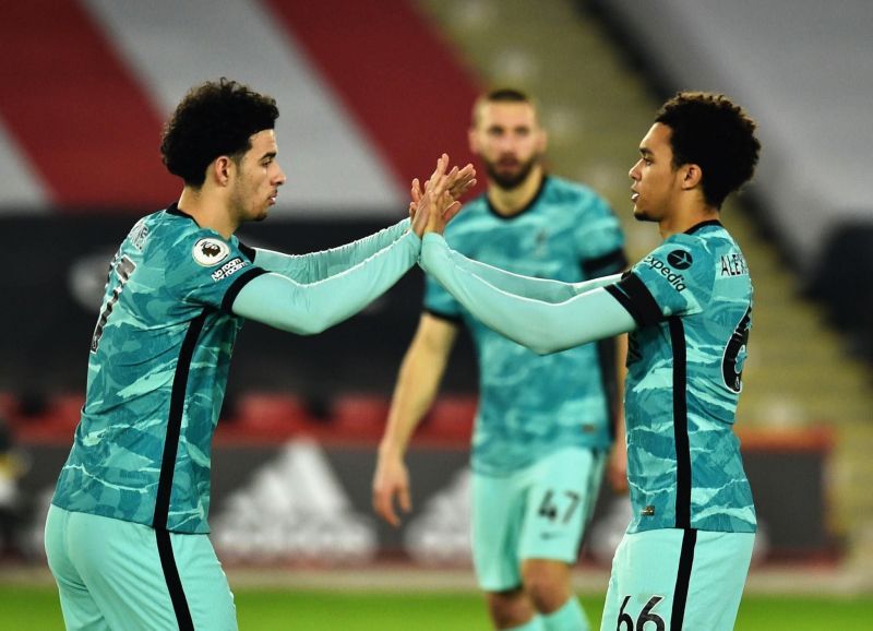 Curtis Jones (left) celebrates his goal after giving Liverpool the lead.