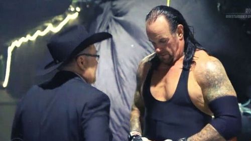 Jim Ross and The Undertaker.