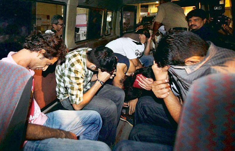 A group of people sitting in a train<p>​</p><p>Description automatically generated with low confidence