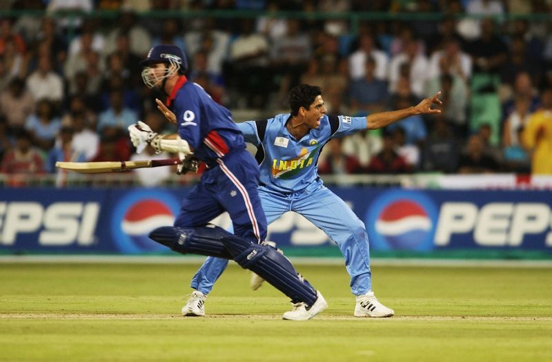 Ashish Nehra celebrates a wicket.