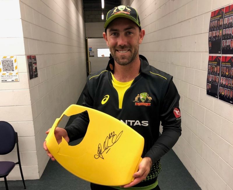 Glenn Maxwell with the broken seat. Pic: cricket.com.au