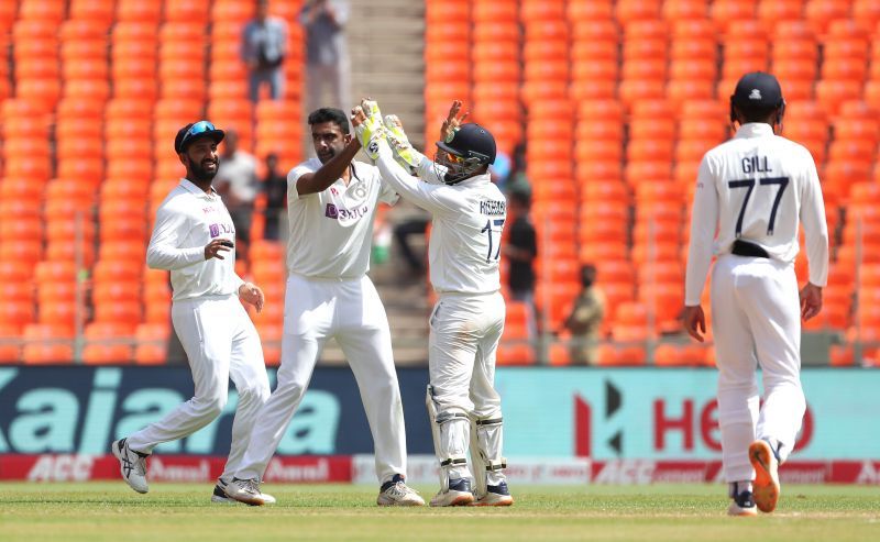 Ravichandran Ashwin celebrating the fall of a wicket.