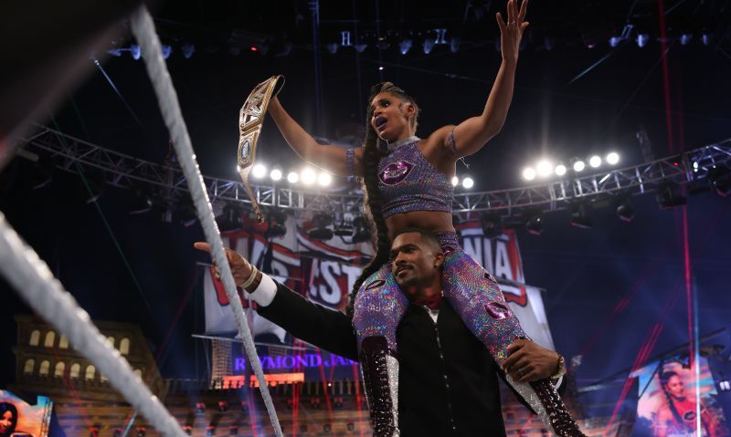 Bianca Belair celebrates her victory at WrestleMania with husband Montez Ford