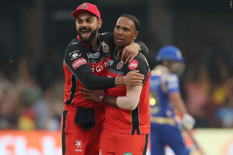 Samuel Badree(right) celebrating after picking up a hat-trick against MI in 2017