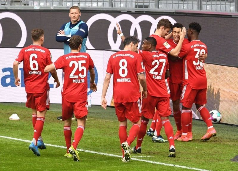 Bayern Munich saw off Wolfsburg in a five-goal thriller.