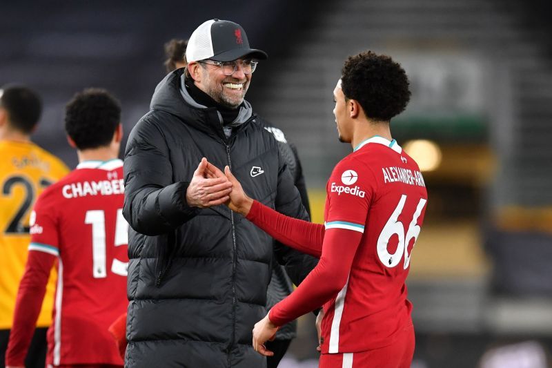 Liverpool&#039;s Jurgen Klopp (L) and Trent Alexander-Arnold