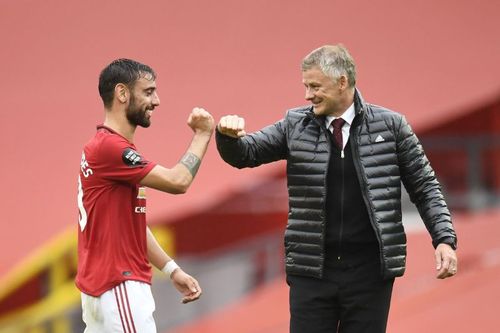 Manchester United's Bruno Fernandes and Ole Gunnar Solskjær