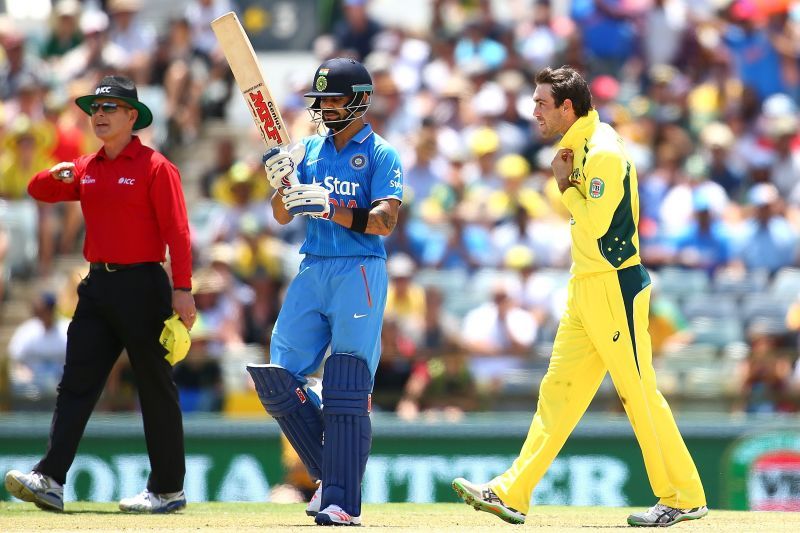 Virat Kohli (L) & Glenn Maxwell in their national colors.