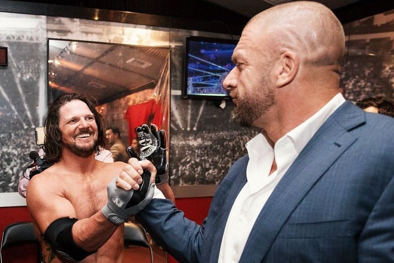 AJ Styles and Triple H backstage