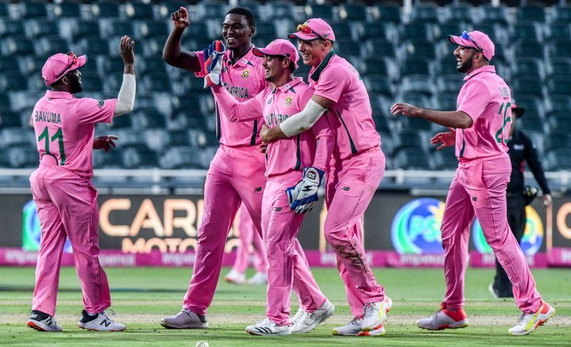 South African fielders celebrate Fakhar Zaman's run-out.