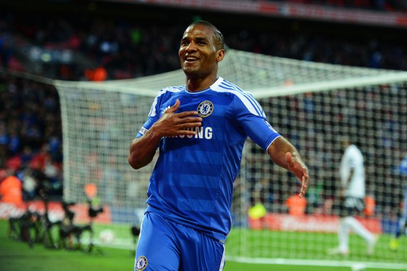 Florent Malouda celebrates a goal for Chelsea.