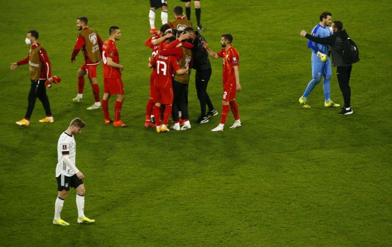 North Macedonia players celebrate after beating Germany