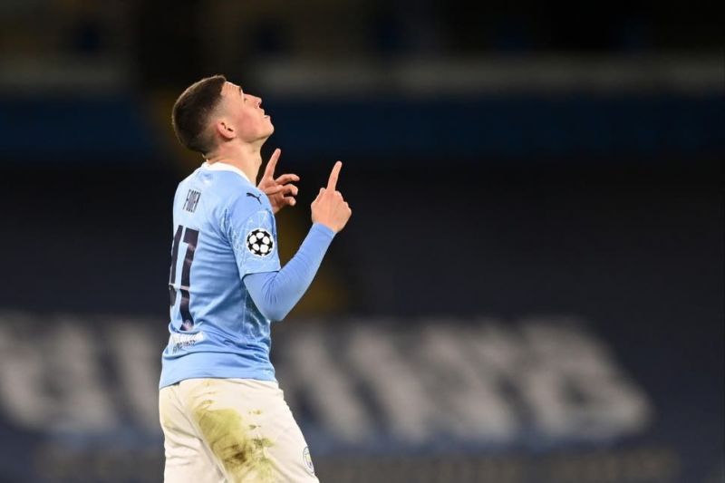 Phil Foden rejoices after scoring Manchester City&#039;s winner.