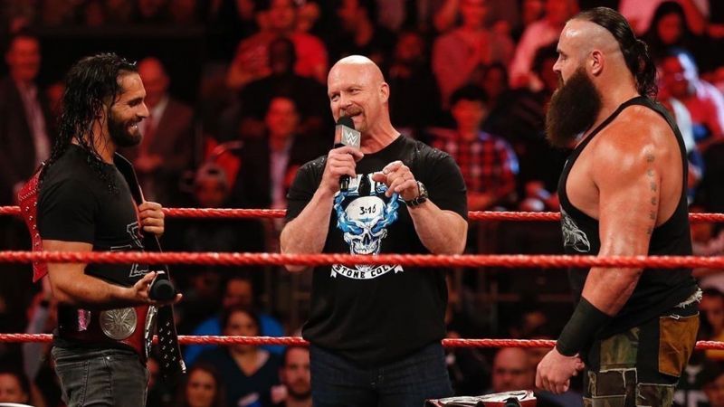 Seth Rollins pictured with Stone Cold Steve Austin and Braun Strowman