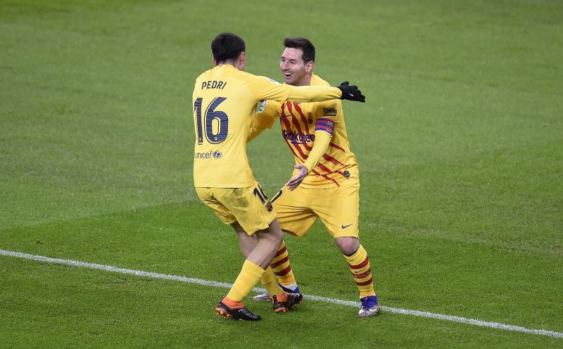 Lionel Messi celebrating with Pedri