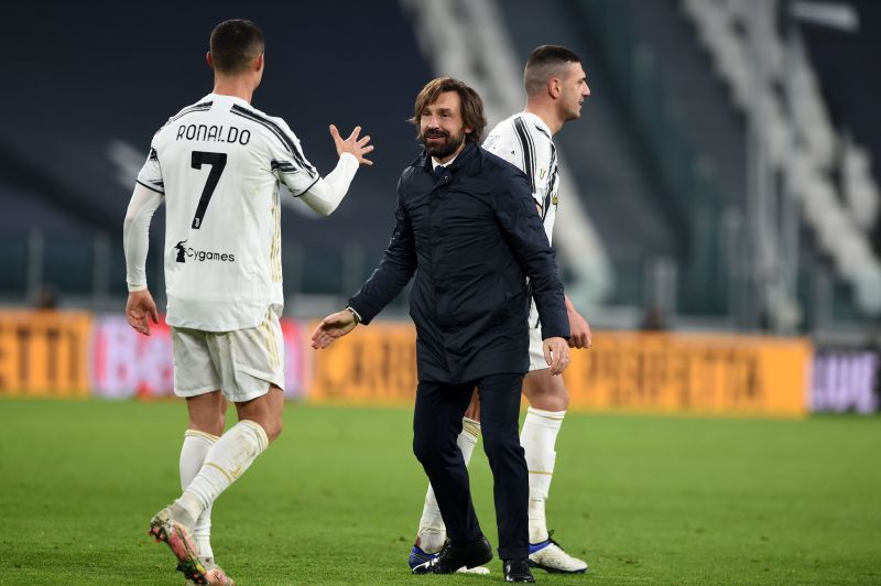 Andrea Pirlo and Cristiano Ronaldo greet each other