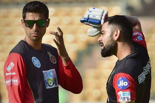 Ashish Nehra with Virat Kohli in 2018 (Image courtesy mykhel.com)