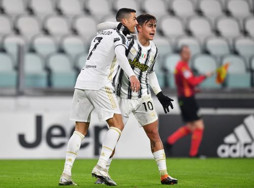 Cristiano Ronaldo (L) and Paulo Dybala