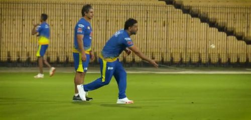 MS Dhoni playing a game of 'Bocce' with Tommy Simsek (L)