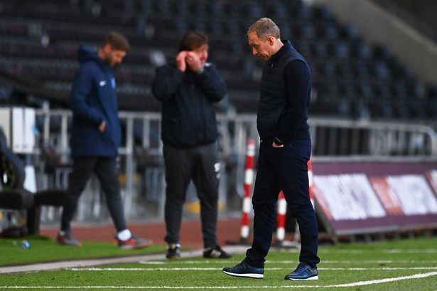 A dejected Steve Cooper following Swansea&#039;s latest EFL Championship defeat to Preston North End