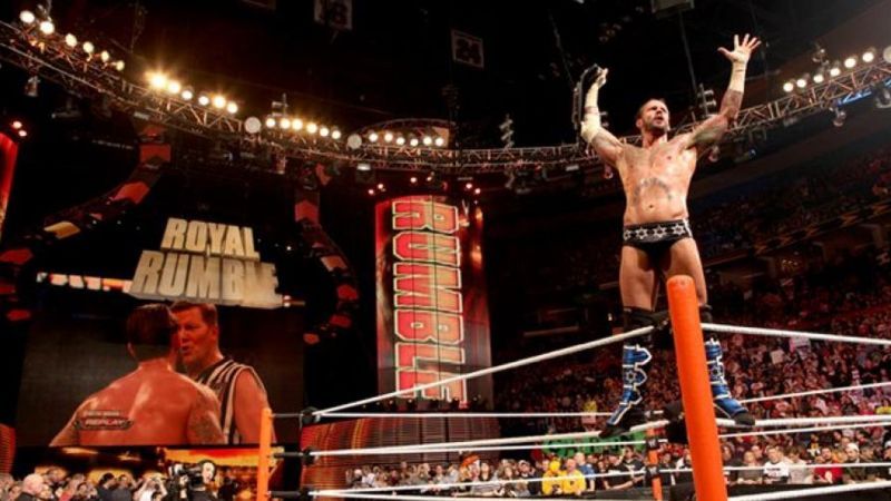 CM Punk defended the WWE Championship against Dolph Ziggler with John Laurinaitis as the special guest referee