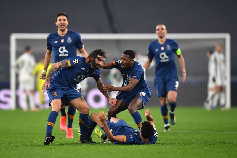 Sergio Oliveira (left) celebrates with Manafa and Diaz after scoring against Juventus