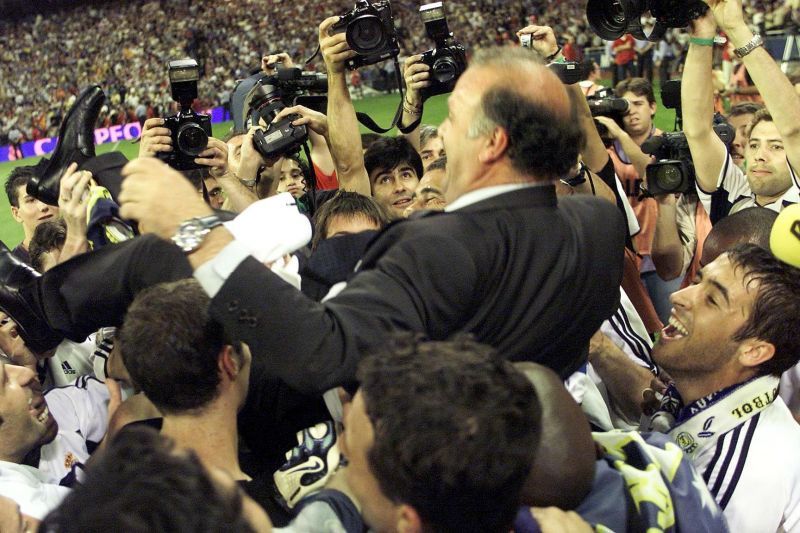 Real Madrid coach Vicente Del Bosque is lifted in the air by his players after clinching La Liga Championship in 2001