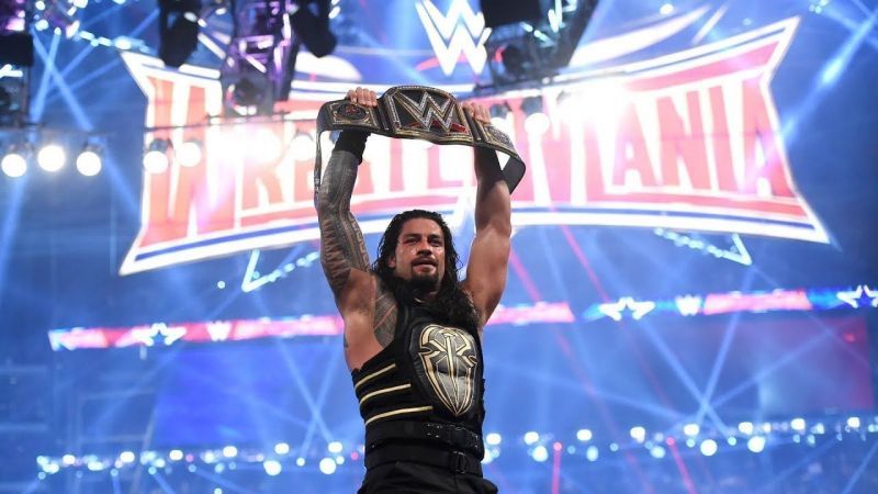 Roman Reigns with the WWE Championship at WreslteMania 32