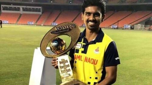 Tamil Nadu's Murugan Ashwin poses with the Syed Mushtaq Ali Trophy