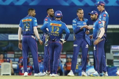 Mumbai Indians celebrate the fall of Rahul Tripathi's wicket. Pic: IPLT20.COM