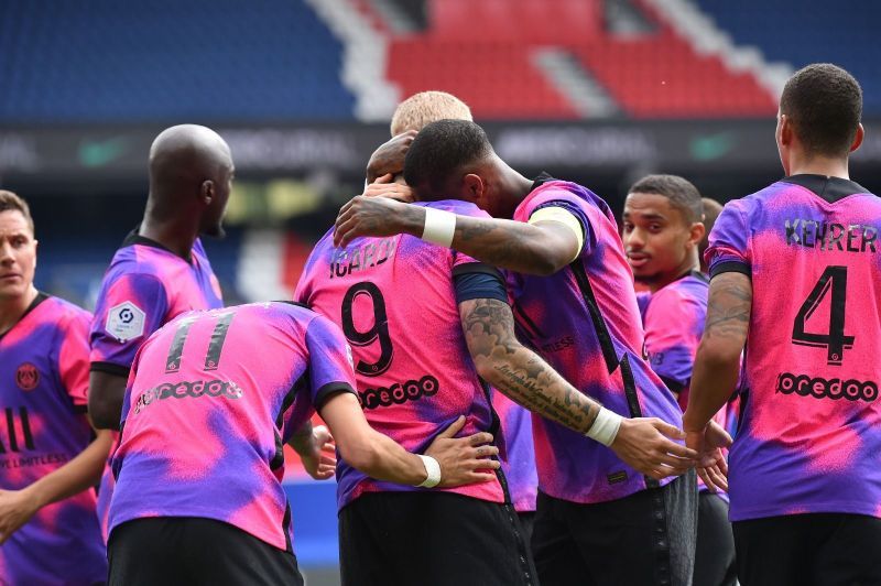 PSG players celebrate after scoring a goal.