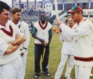 Zimbabwe team celebrates after the third Test, which ended in a draw. This was their first overseas Test series win (Source: AFP)