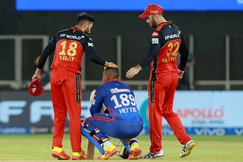 Shimron Hetmyer is consoled by Virat Kohli and Glenn Maxwell. Pic: IPLT20.COM