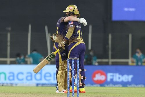 Dinesh Karthik embraces Eoin Morgan