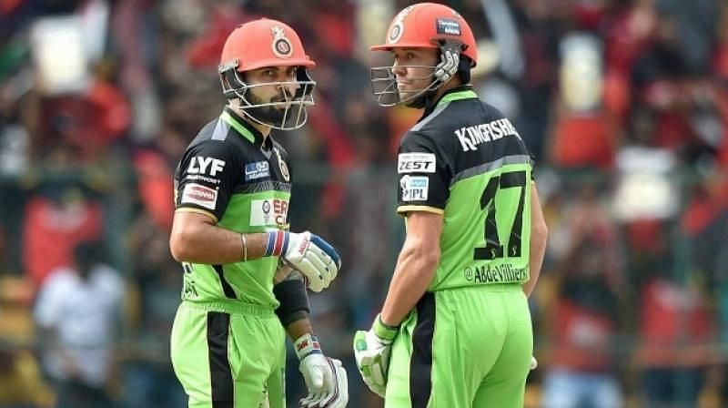 Virat Kohli (left) and AB De Villiers featured in a record partnership.
