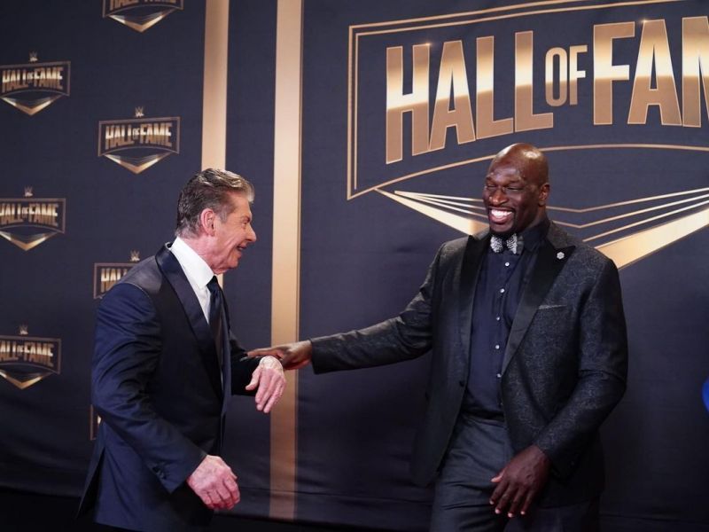 Titus O'Neil and Vince McMahon having some fun at the 2021 WWE Hall of Fame ceremony