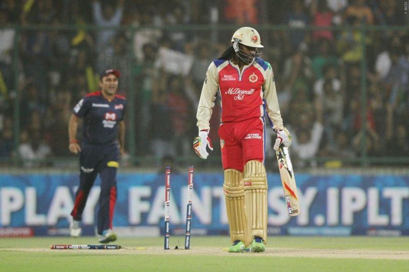 Chris Gayle of RCB is bowled by Irfan Pathan of DD. (Source: Sportzpics for BCCI/IPLT20)