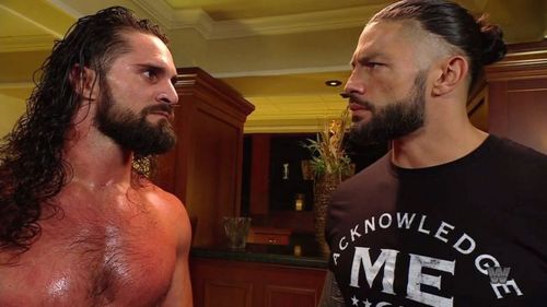 Seth Rollins (left); Roman Reigns (right)