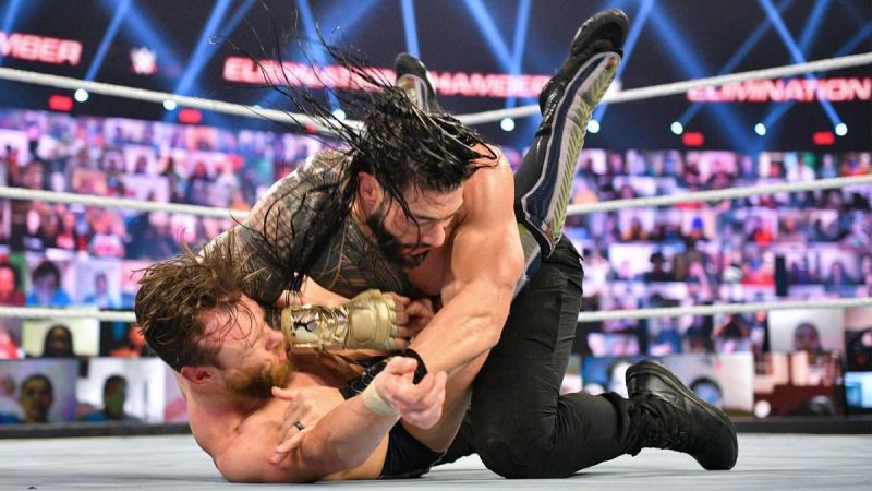 Roman Reigns assaulting Daniel Bryan